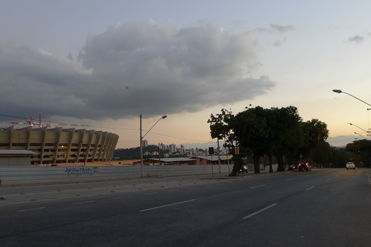 Southwest bound view of Avenida Antonio Abrahao Caram with buildings and traffic in Belo Horizonte, Minas Gerais, Brazil