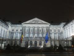 Parliament building illuminated at night in Brussels Belgium