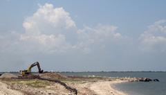 Construction crews repairing road on Texas City dike after Hurricane Ike