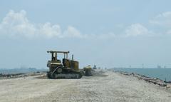 Construction crews repairing road on Texas City dike after Hurricane Ike