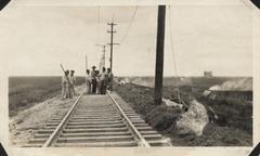 Railroad crew repairing track at Texas City junction after 1915 Galveston Hurricane