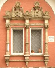 Paired architrave of the Sukharev Tower mounted in the wall of the Donskoy Monastery in Moscow