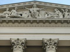National Museum building in Budapest with classical architecture and blue sky
