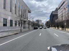 6th Street in Philadelphia with storefronts and pedestrians