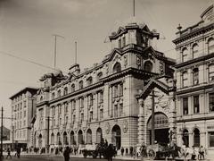 Central Post Office building with visible station entrance in Manila