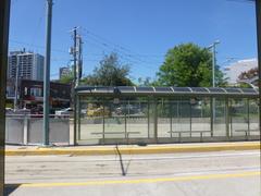 Bus and streetcar platforms at Broadview TTC Station with vehicles and passengers