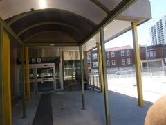 Bus and streetcar platforms at Broadview TTC Station with vehicles and passengers