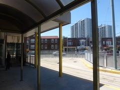 Bus and streetcar platforms at Broadview TTC Station with vehicles and passengers