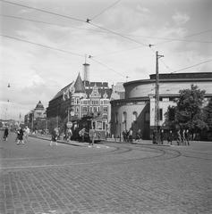 Street view of Swedish Theater on Mannerheimintie in central Helsinki with old trams and historic buildings in 1946