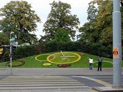 Large floral clock made of grass and colorful flowers in Geneva Switzerland