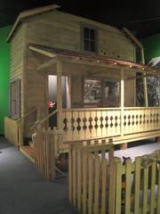 Exhibit showcasing a historical house model at HistoryMiami museum in Miami-Dade Cultural Center
