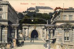 Historic Budapest tunnel entrance in 1907 with pedestrians and horse-drawn carriage
