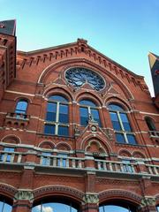 View of Cincinnati Music Hall, a historic red brick building with ornate architectural details in Over-the-Rhine, Cincinnati, Ohio