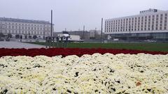 Pilsudski Square in Warsaw with buildings and trees in autumn