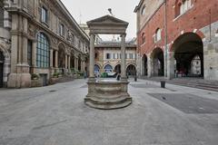 Dei Mercanti square in Milan with historic buildings and outdoor seating