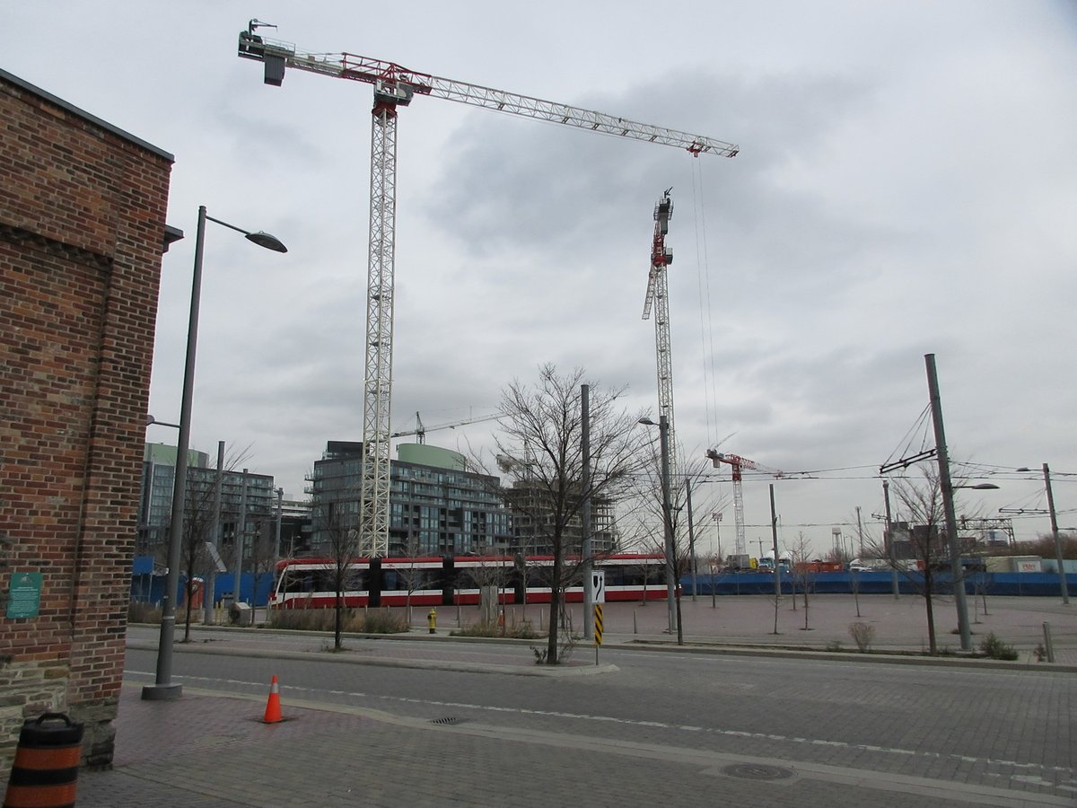 Cherry Street TTC streetcar loop with tracks and overhead wires on a cloudy day