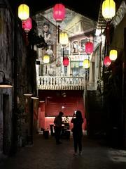 Night scene at Kwai Chai Hong, Lorong Panggong, Kuala Lumpur with illuminated mural art