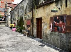Colorful murals at Kwai Chai Hong in Lorong Panggong, Kuala Lumpur showcasing vibrant street art