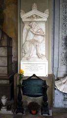 Monument in Staglieno Cemetery with sculptures and inscriptions