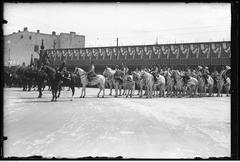 Military regiment on Królewska street near Marshal Józef Piłsudski square with orchestra and Jelen soap advertisement