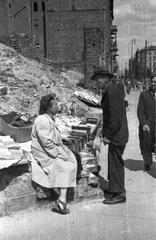 Book seller amid ruins in Warsaw one month before Warsaw Uprising, Graniczna 2 street corner Królewska street