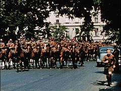 Polish cavalry with horse-drawn machine guns on Królewska 6 Street, Warsaw, August 1939