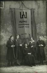 The flag of the Lithuanian Church of Saint Nicholas in Vilnius, 1926, with Emilija Vileišienė seated and weavers standing