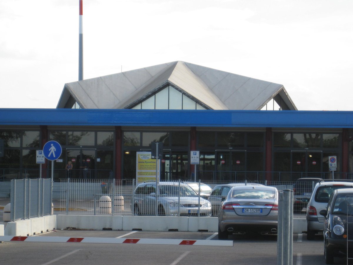 Aerial view of Forlì Airport with runway and terminal building