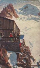 Three hikers outside a cabin on Mont Blanc mountain in winter