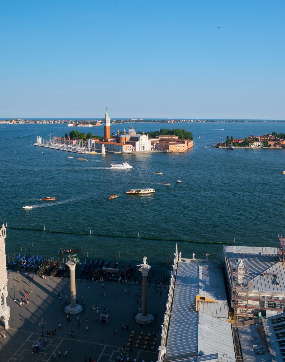 Colorful graffiti art with faces on a wall in an urban area
