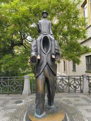Franz Kafka statue by Jaroslav Róna in Prague, Czech Republic
