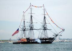 USS Constitution fires 21-gun salute toward Fort Independence on July 4, 2011 in Boston Harbor