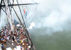 USS Constitution firing 21-gun salute near Fort Independence on Castle Island during Independence Day demonstration
