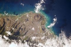 View of Honolulu, Hawaii from the International Space Station showing a landmass surrounded by ocean