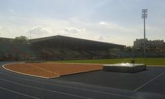 Aerial view of Stade Josy Barthel stadium with surrounding cityscape under clear sky