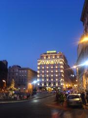 Hotel Bernini illuminated at night in Rome
