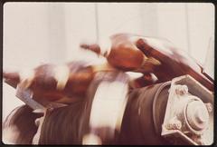 Beer bottles being fed into a bottle crusher for glass recycling at Coors Brewery