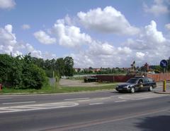 Scenic view of Szczytno town in Poland with colorful buildings and church steeple under clear sky