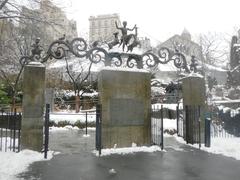 Children's Zoo gates covered in fresh snowfall, viewed from the east