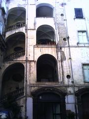 Open staircase on the left side in Palazzo Carafa della Spina, Naples, Italy