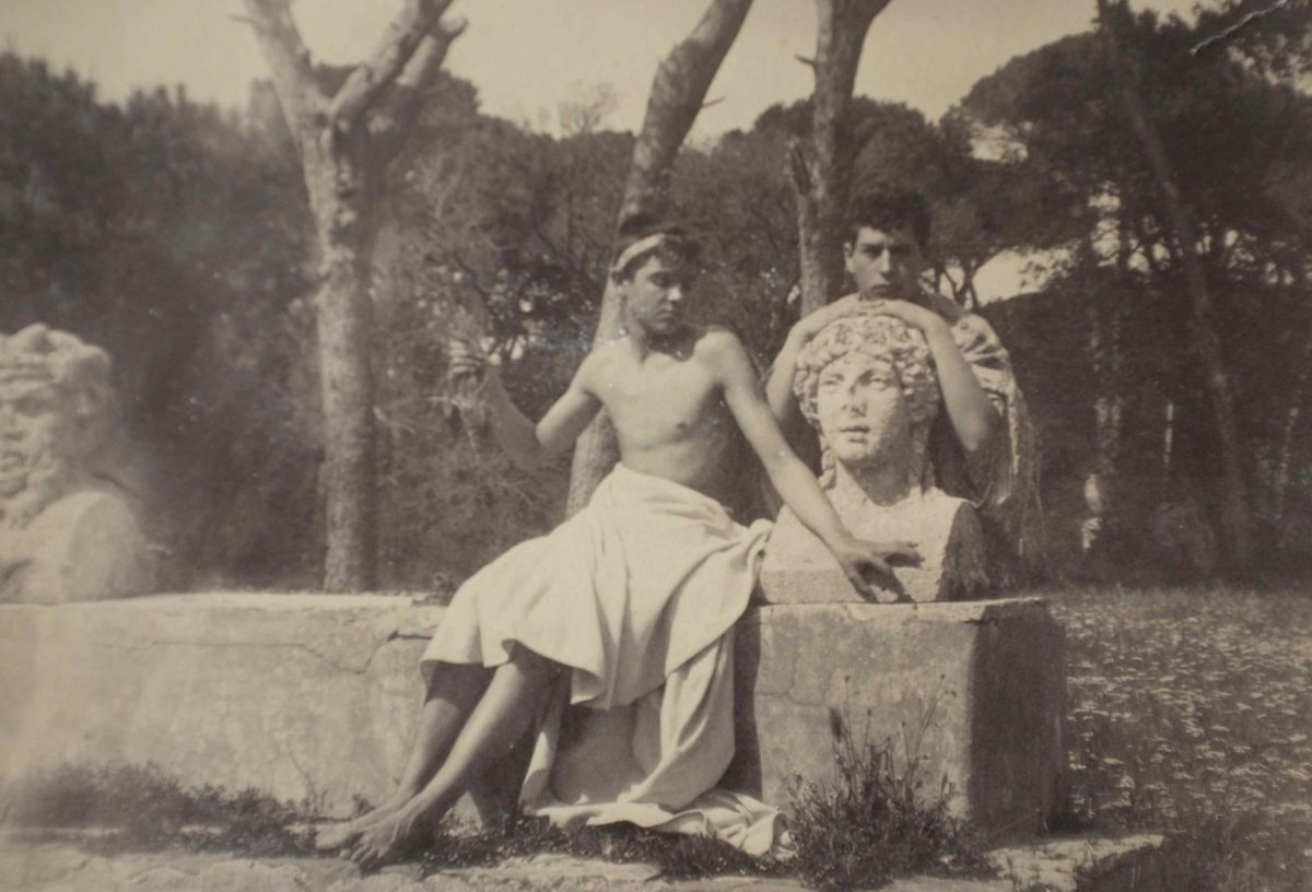 Half clad boys in the garden of Castello Chigi villa at Castel Fusano near Rome by Wilhelm von Plüschow