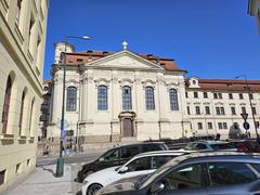 Street view of Resslova Street in Prague with surrounding buildings and urban elements