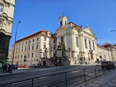 Pražská Resslova street with surrounding objects and buildings on a clear day