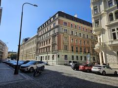 Pražská Resslova street with surrounding buildings and trees in Prague