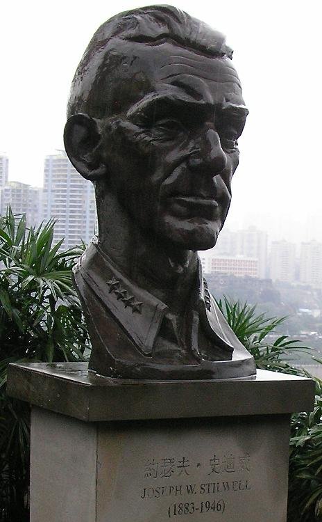Bust of Joseph Stilwell outside the Former Residence of General Stilwell Museum in Chongqing China with river and buildings in background