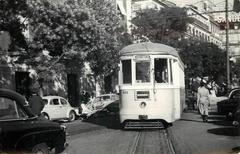 Vintage tram in Lisbon on a street at Restauradores square in 1961