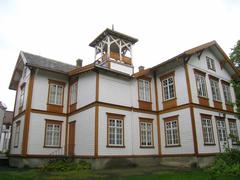 Ringve Museum exterior in Trondheim, Norway with well-maintained garden and clear sky