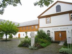 Exterior view of Ringve Museum in Trondheim Norway surrounded by greenery