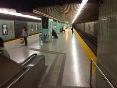 Wide platform view of York Mills station on the TTC Yonge-University-Spadina subway line with livery visible