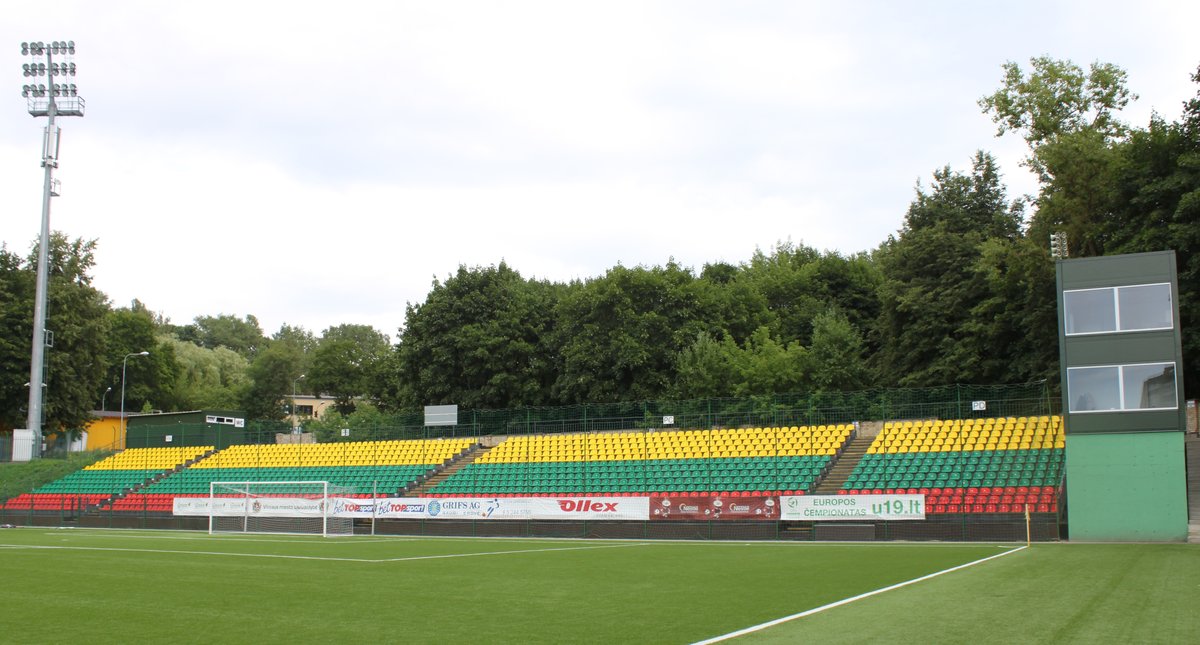 South stand of the LFF stadium with spectators and green field